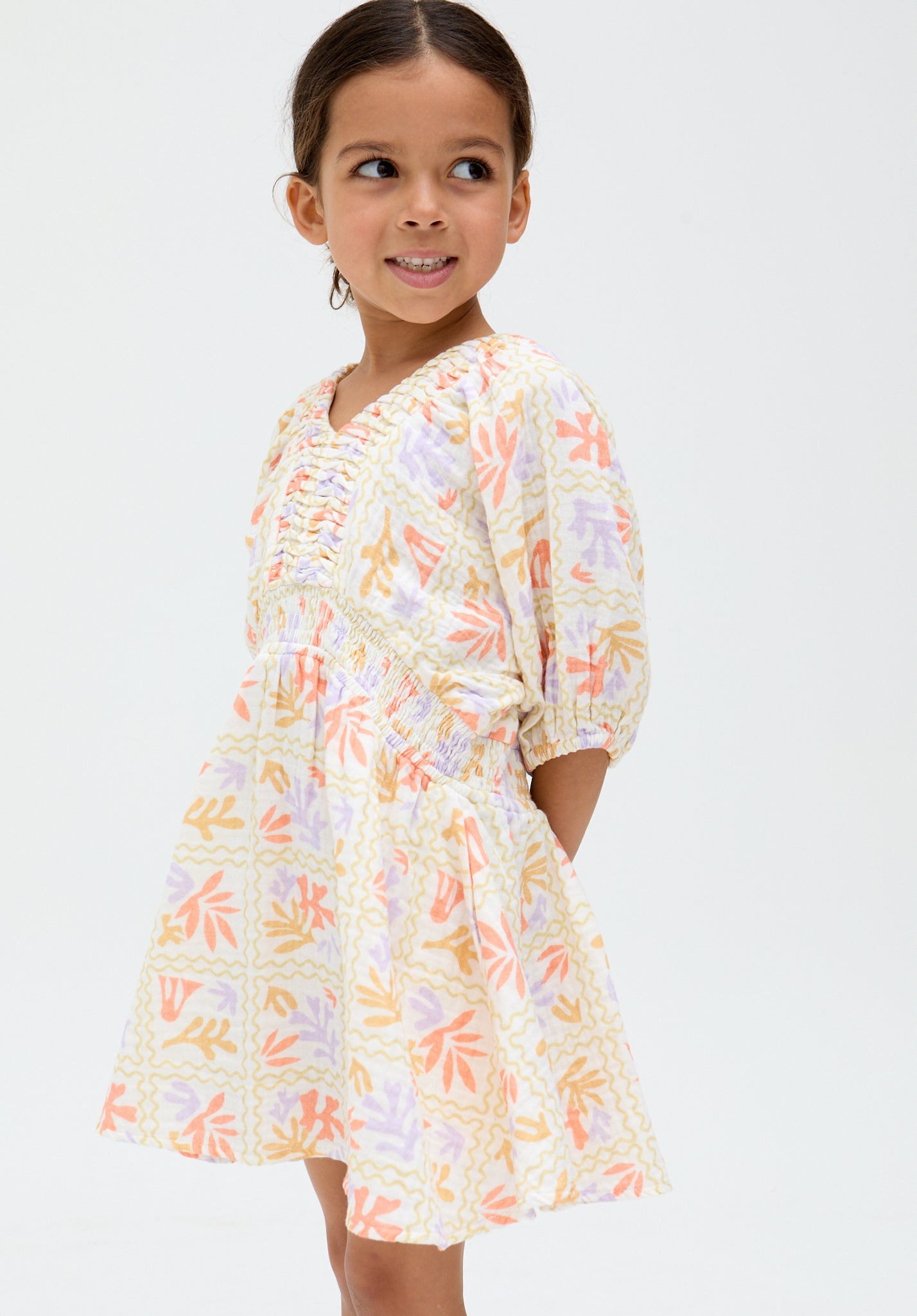 model wearing Kids Soipoi Ruched V-Neck Matisse Print Dress In Multi - image 4