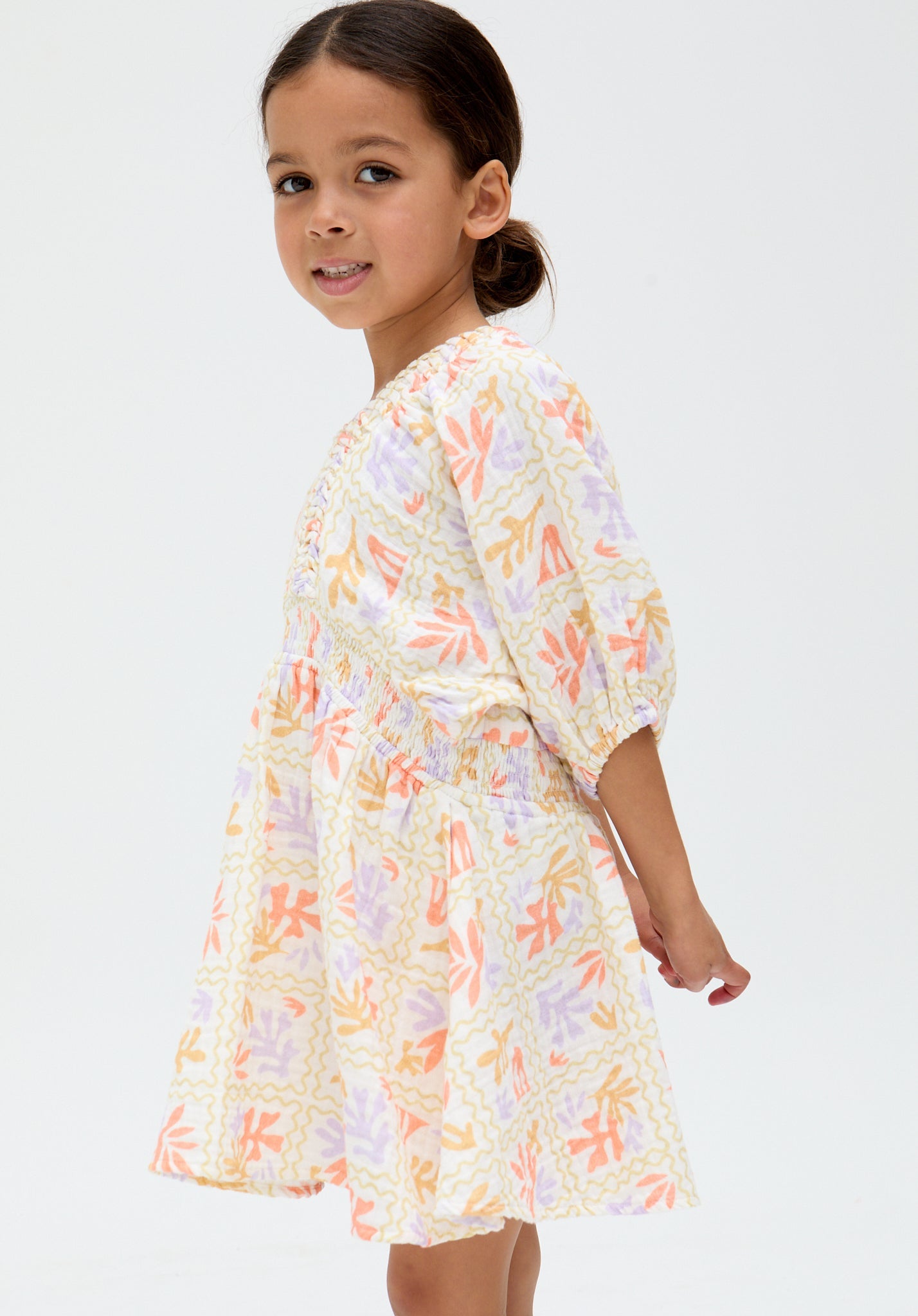 model wearing Kids Soipoi Ruched V-Neck Matisse Print Dress In Multi - image 3